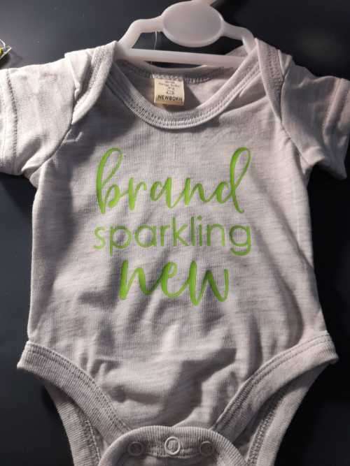 New born baby grow with free baby on board sign