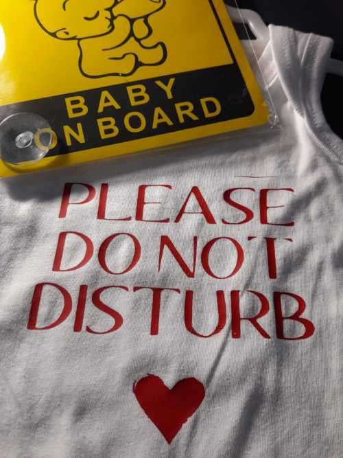 New born baby grow with free baby on board sign
