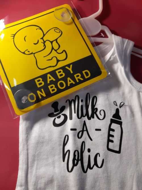 New born baby grow with free baby on board sign