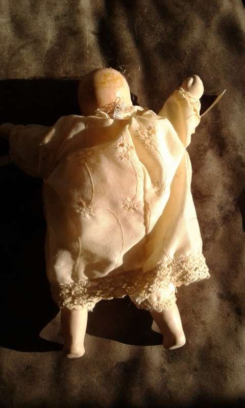 Small Vintage Doll head, feet and hands porcelain rag body