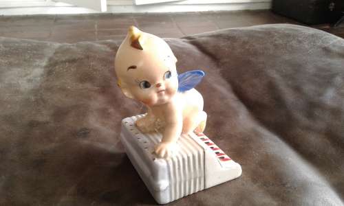 Art Deco Porcelain Baby Doll Angel Accordion Piano Figurine