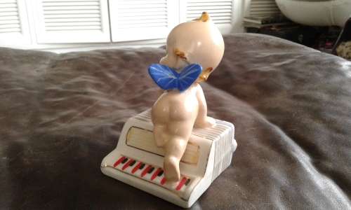 Art Deco Porcelain Baby Doll Angel Accordion Piano Figurine