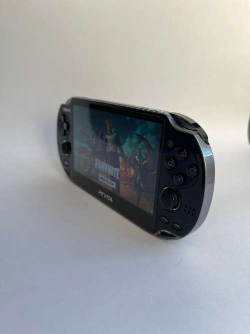 PS Vita OLED (Mint Condition) and Games