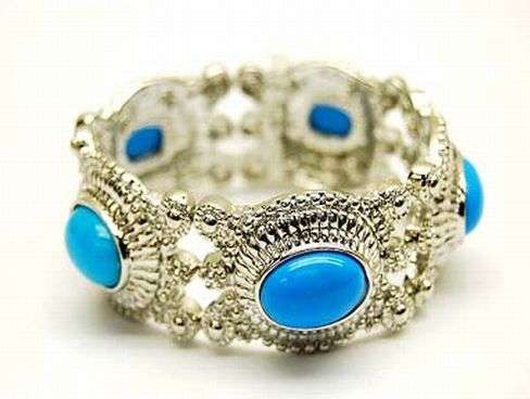 TURQUOISE_OVAL_BEADS_INLAYS_IN_SILVER_COLOR_STRETCHY_BRACELET