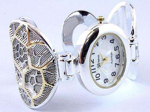 HIGHLY POLISHED - GENEVA PLATINUM CUFF WATCH WITH ROUND PATTERNED ARMBAND