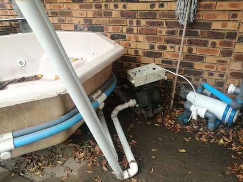 Large Jacuzzi with plumbing. No pumps. Good condition.