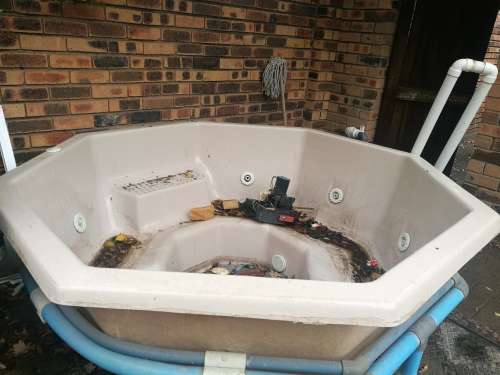 Large Jacuzzi with plumbing. No pumps. Good condition.