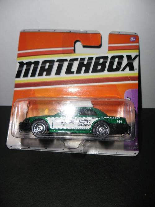 Matchbox 06 Ford Crown Vic Taxi(mint in Blister Pack) - see photos for condition