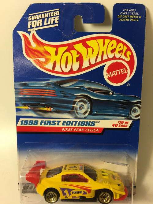 Hot Wheels - Pikes Peak Celica - 1998 First Editions #15 - Yellow - Long Card - Card Damaged