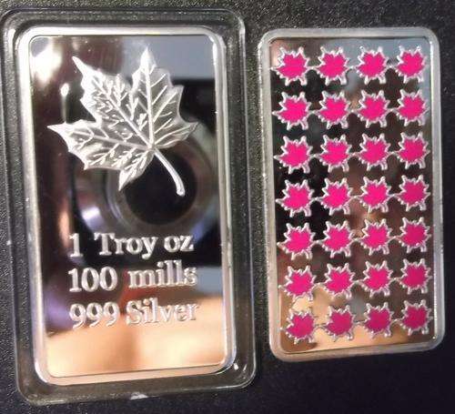 1 OZ .999 - 100 MILLS FINE SILVER PLATED MAPLE LEAF SILVER BAR.