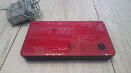 Red DSi XL Console Super Mario Bros 25th Anniversary, charger + Free game