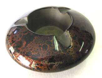 Lacquer and brass ashtray