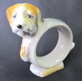 Ceramic serviette ring -- dog