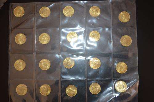 60x First decimal half cents in a coin sleeve. 1961-1964