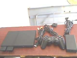 Sony Playstation 2  + Cables + 1 Remote Control  + 2 x 8mb Memory Cards