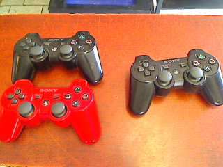 Sony PS3 Wireless Remote Controler x 2 (The one on the right does not charge so it is for spares!!!)