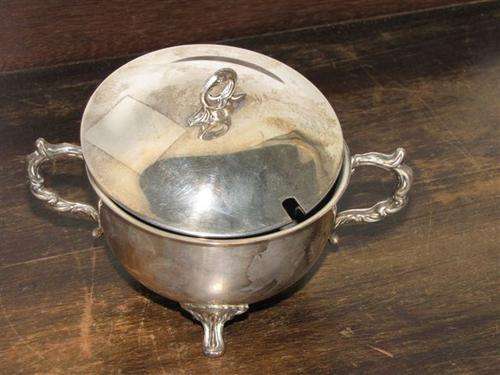 Antique silver plated sugar bowl with EMESS printed at the bottom.