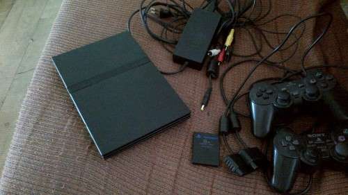 PlayStation 2 plus EXTRAS EXTRAS