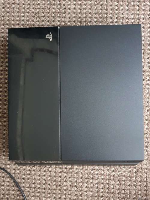 Playstation 4 with v2 controller and games with steering wheel