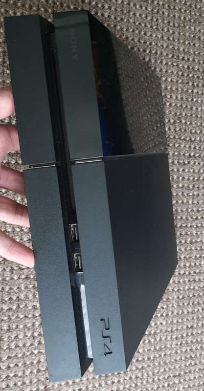 Playstation 4 with v2 controller and games with steering wheel