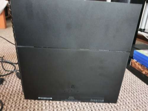Playstation 4 with v2 controller and games with steering wheel