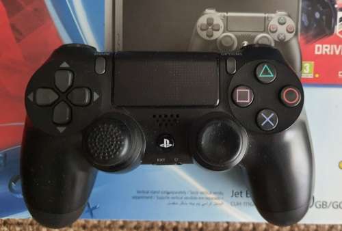 Playstation 4 with v2 controller and games with steering wheel