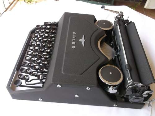(Typewriter) ADLER tikmasjien, versamelstuk in puik toestand.