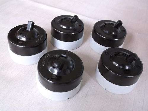 5 Light switches, bakelite & porcelain, 1950ties, never used. Bid as a lot.