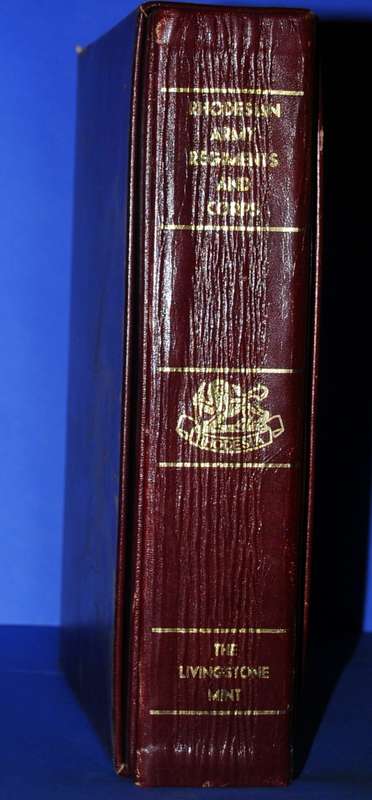 Leather bound Livingstone Mint book of Rhodesian Army Regiments and Corps.