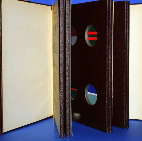 Leather bound Livingstone Mint book of Rhodesian Army Regiments and Corps.