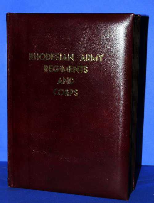 Leather bound Livingstone Mint book of Rhodesian Army Regiments and Corps.