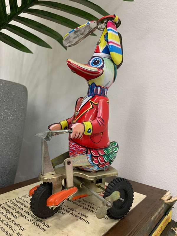 Vintage wind up duck tin toy
