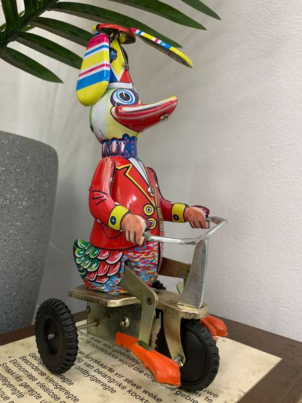 Vintage wind up duck tin toy