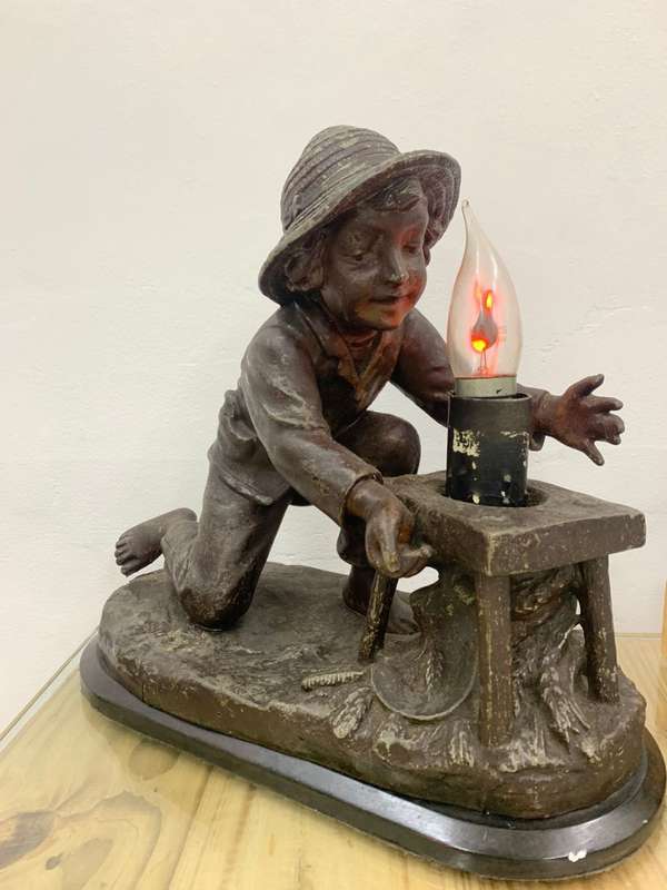 Bronze Boy Holding Lamp