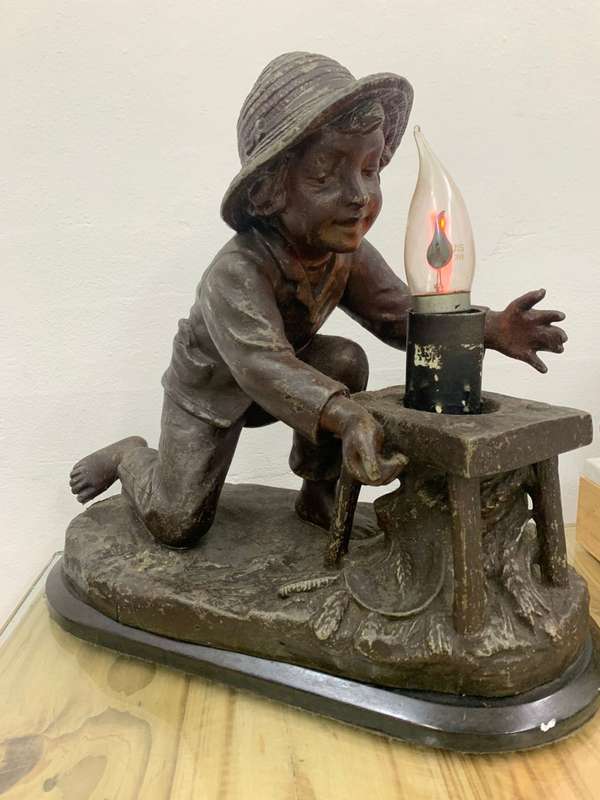 Bronze Boy Holding Lamp