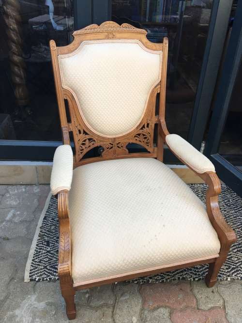 Stunning Edwardian upholstered arm chair with exquisite carved detailing