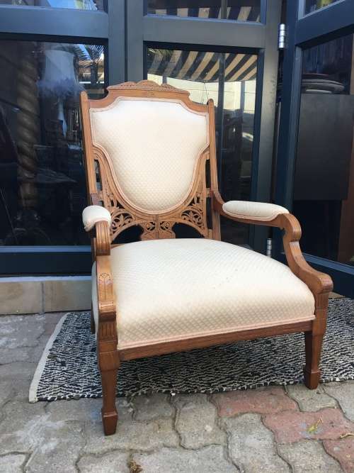 Stunning Edwardian upholstered arm chair with exquisite carved detailing