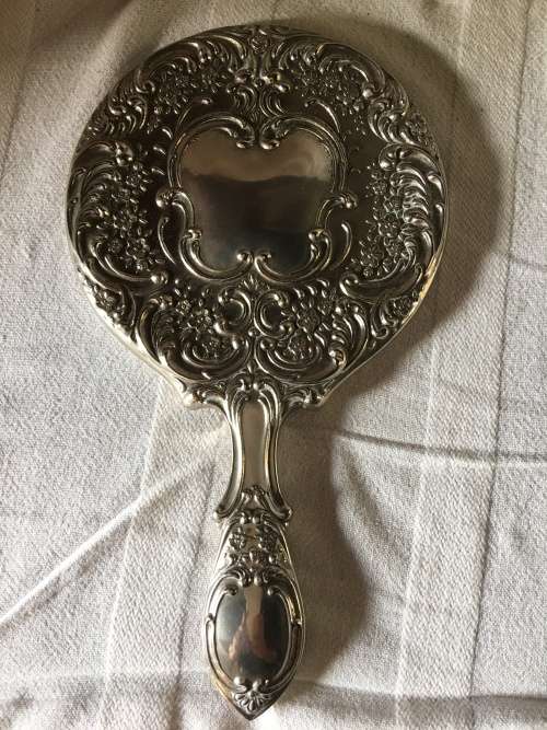 STUNNING ANTIQUE HEAVY SILVER PLATED HAND MIRROR