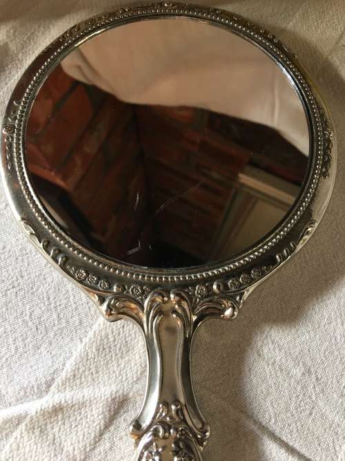 STUNNING ANTIQUE HEAVY SILVER PLATED HAND MIRROR