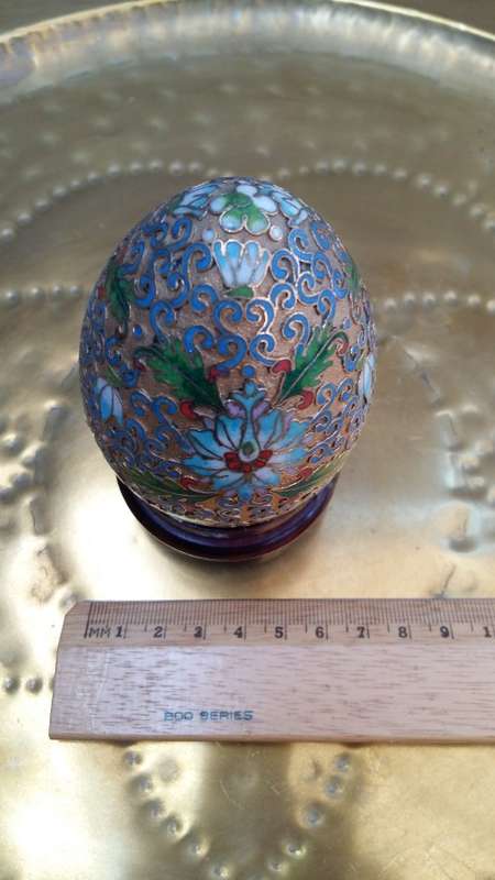 Beautiful brass enameled ornate oriental Cloisonne Egg on carved wooden stand. 10cm