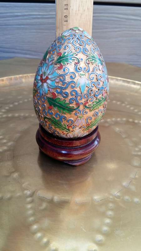 Beautiful brass enameled ornate oriental Cloisonne Egg on carved wooden stand. 10cm