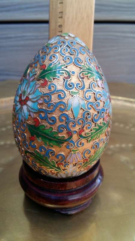 Beautiful brass enameled ornate oriental Cloisonne Egg on carved wooden stand. 10cm