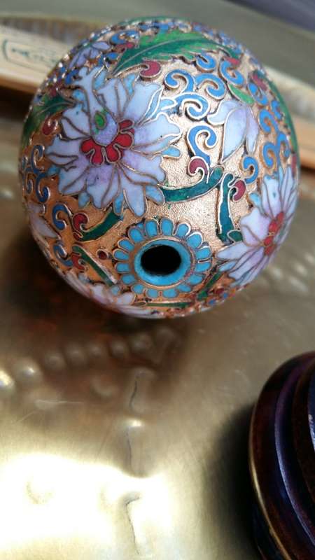 Beautiful brass enameled ornate oriental Cloisonne Egg on carved wooden stand. 10cm