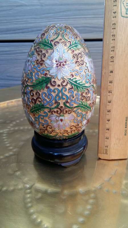 Beautiful brass enameled ornate oriental Cloisonne Egg on carved wooden stand. 14cm