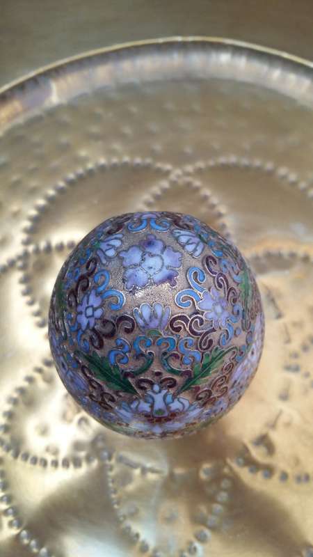 Beautiful brass enameled ornate oriental Cloisonne Egg on carved wooden stand. 14cm