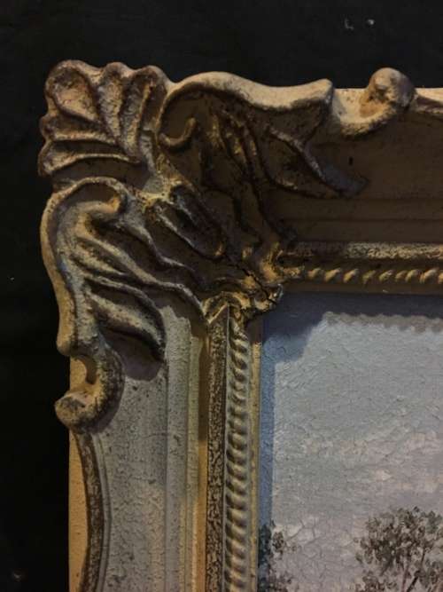 An incredible framed oil on canvas of a cottage scene in an antique frame signed A.L.Kleu