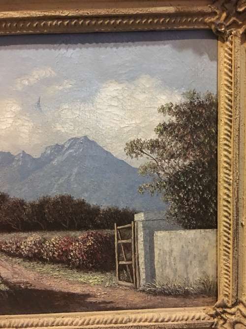 An incredible framed oil on canvas of a cottage scene in an antique frame signed A.L.Kleu