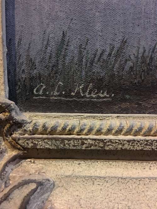 An incredible framed oil on canvas of a cottage scene in an antique frame signed A.L.Kleu