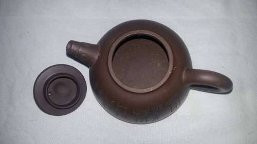Highly Collectible Yixing Chinese vintage clay Half moon Tea Pot. 250ml. With Chinese Calligraphy.