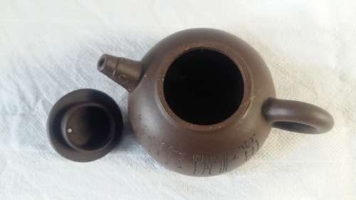 Highly Collectible Yixing Chinese vintage clay Half moon Tea Pot. 250ml. With Chinese Calligraphy.